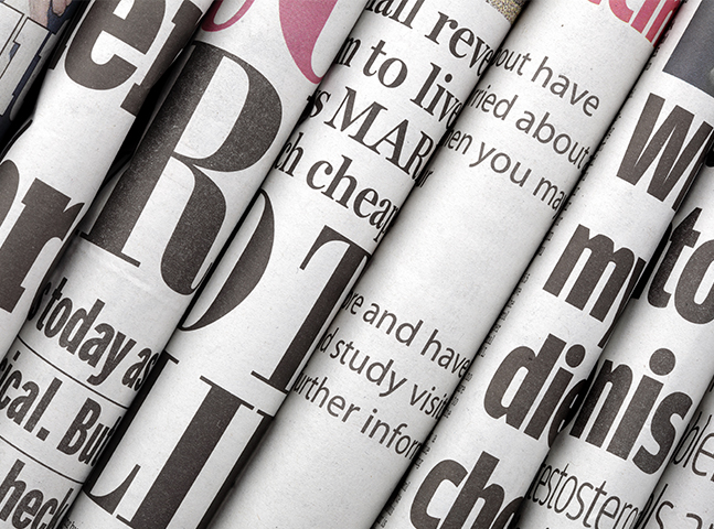 Rolled Newspaper Pages